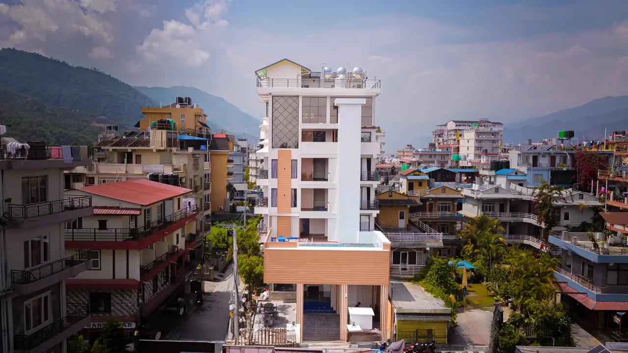 Aerial view of Hotel Sampada Boutique rising above Lakeside, Pokhara