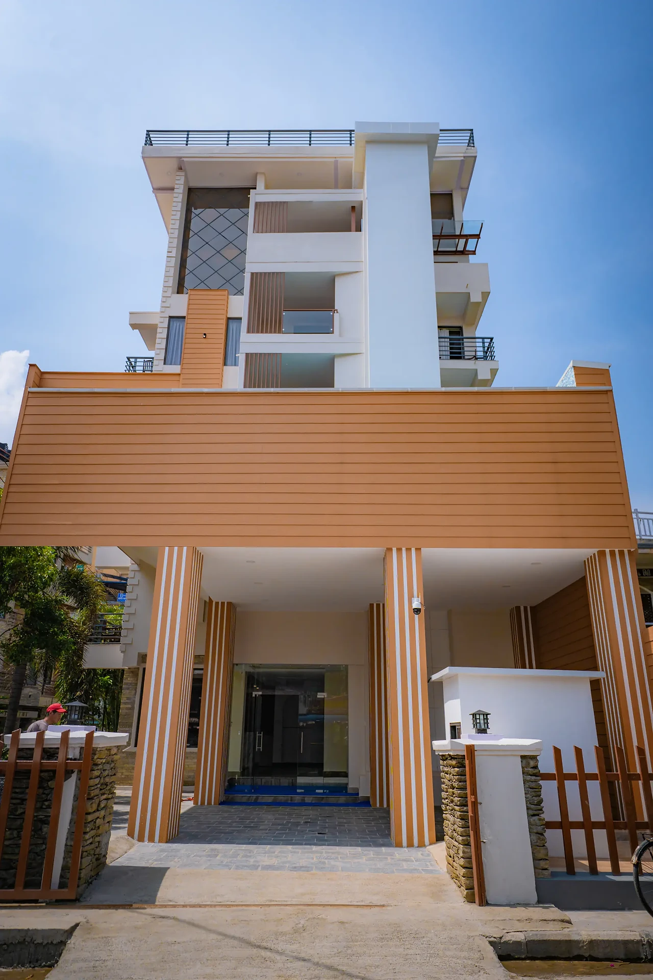 Timber-clad entrance of Hotel Sampada Boutique